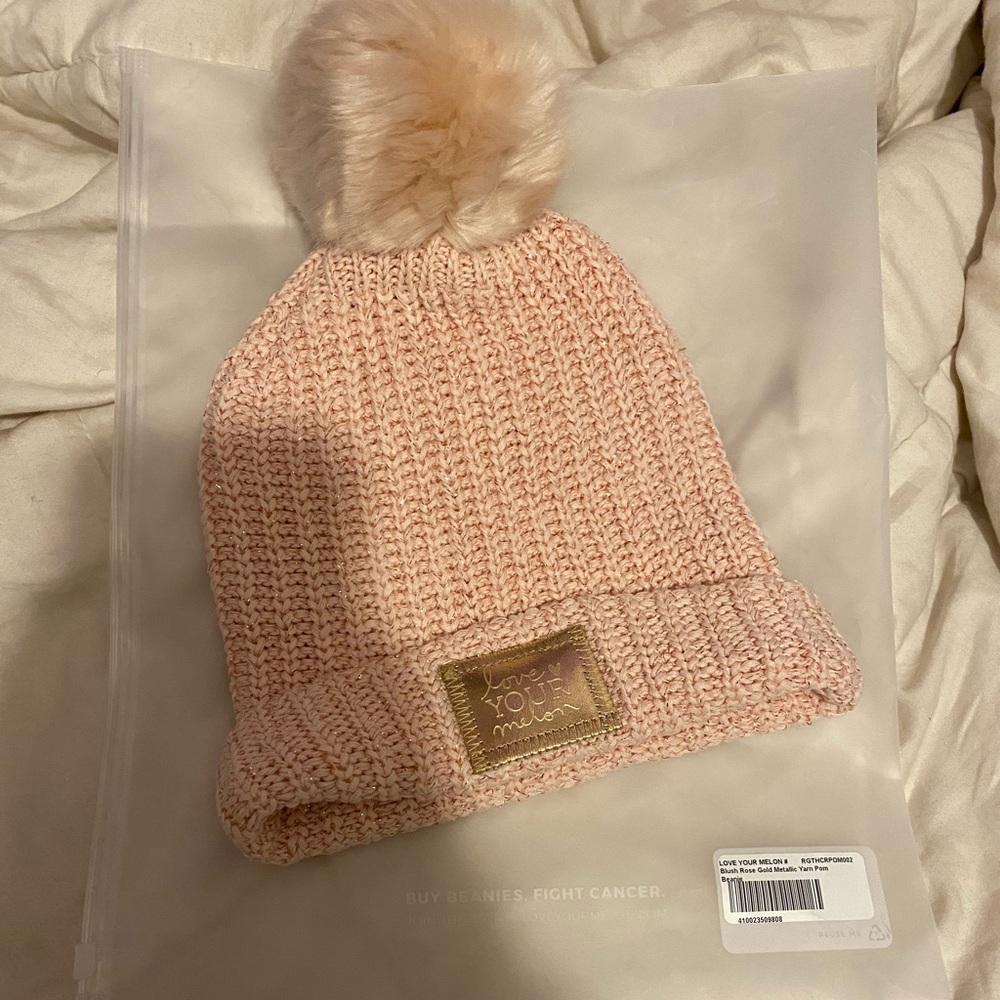 NWT. Love Your Melon Rose Gold Metallic Pom Beanie